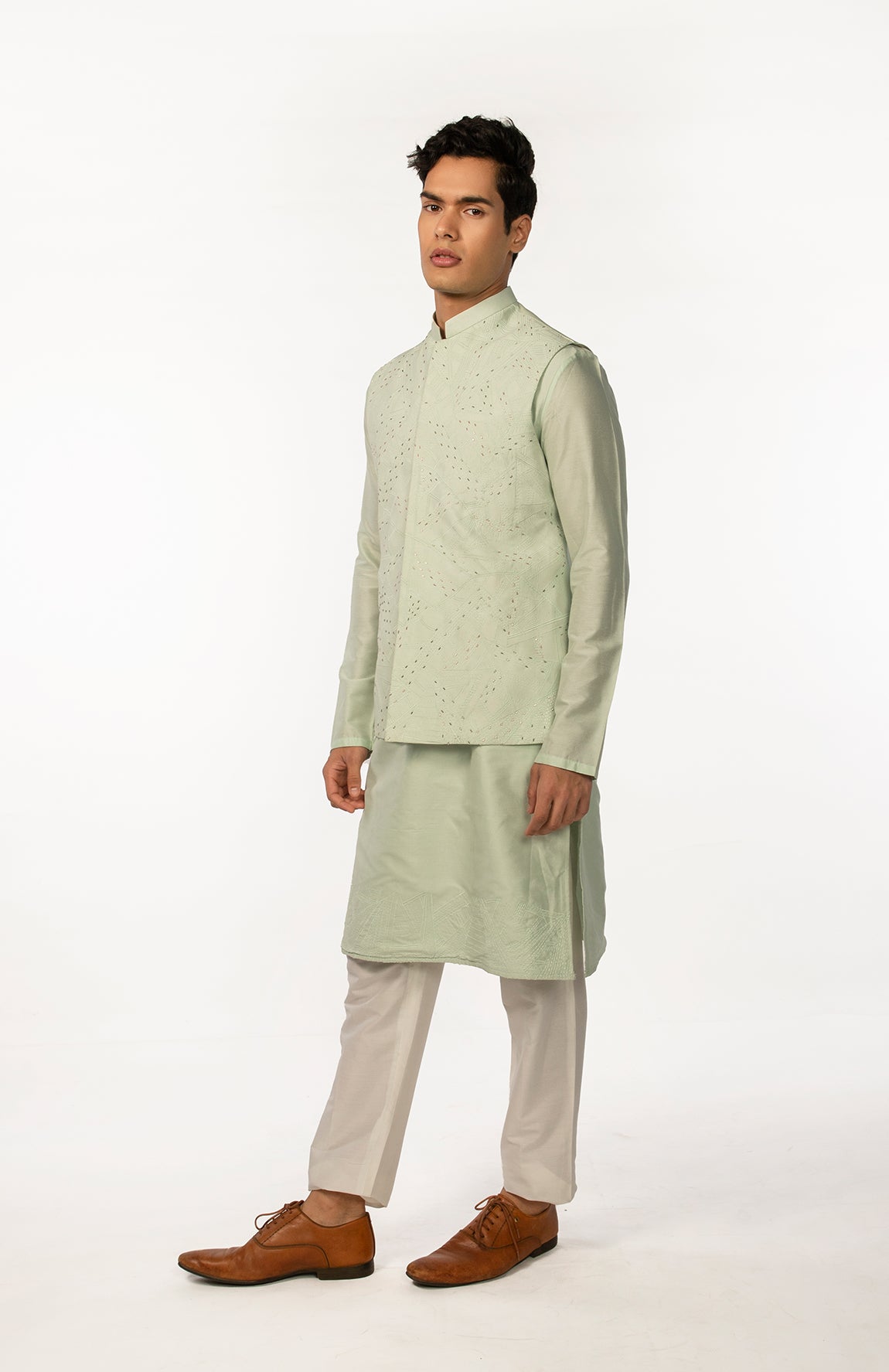SOOTHING GREEN EMBROIDERED WITH HIGHLIGHTS BUNDI WITH GREEN EMBROIDERED KURTA SET