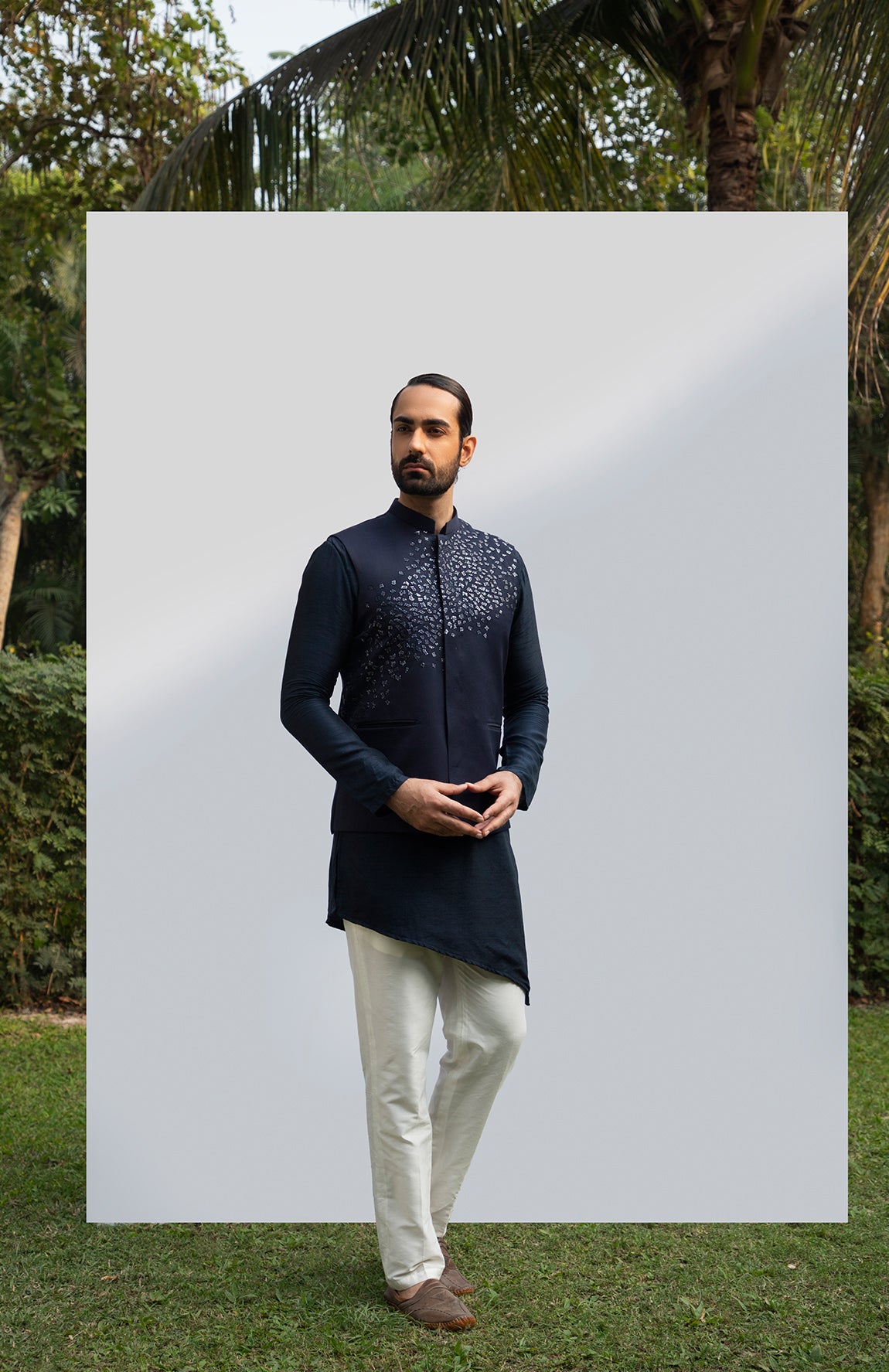 NAVY BLUE ASYMMETRICAL KURTA SET WITH NAVY BLUE EMBELLISHED BUNDI